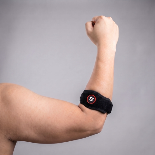 Person wearing the elbow brace during activity