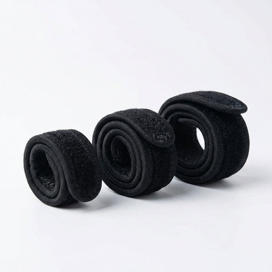 Three interchangeable ankle brace straps, rolled